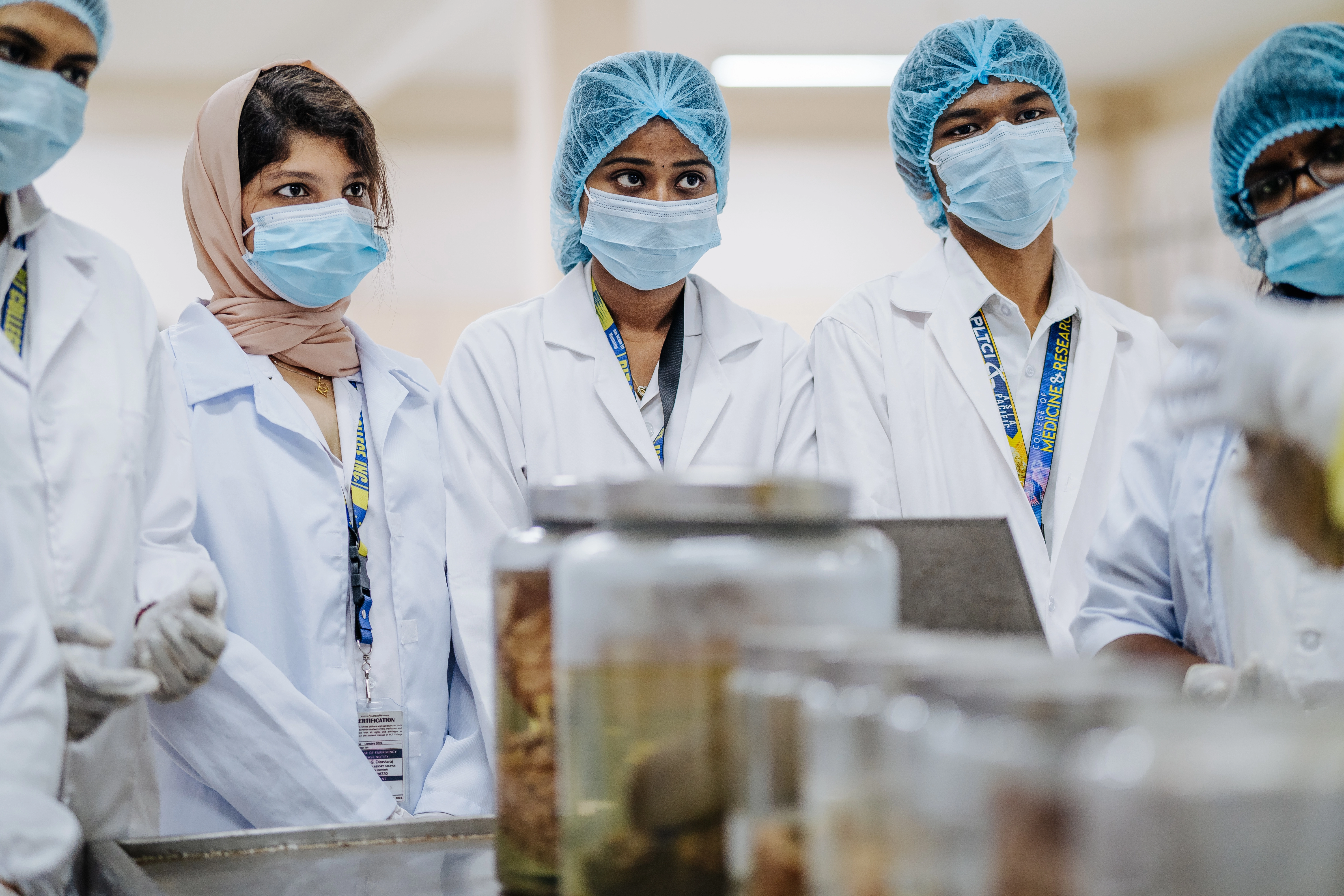 Students learning essential microscopy and diagnostic laboratory procedures